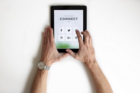 hands using a tablet