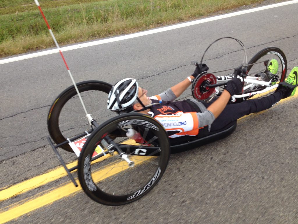 man handcycling