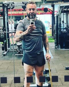 Man in gym with walker 
