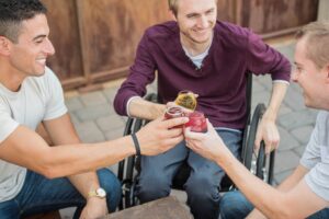 group of friends cheering with their drinks
