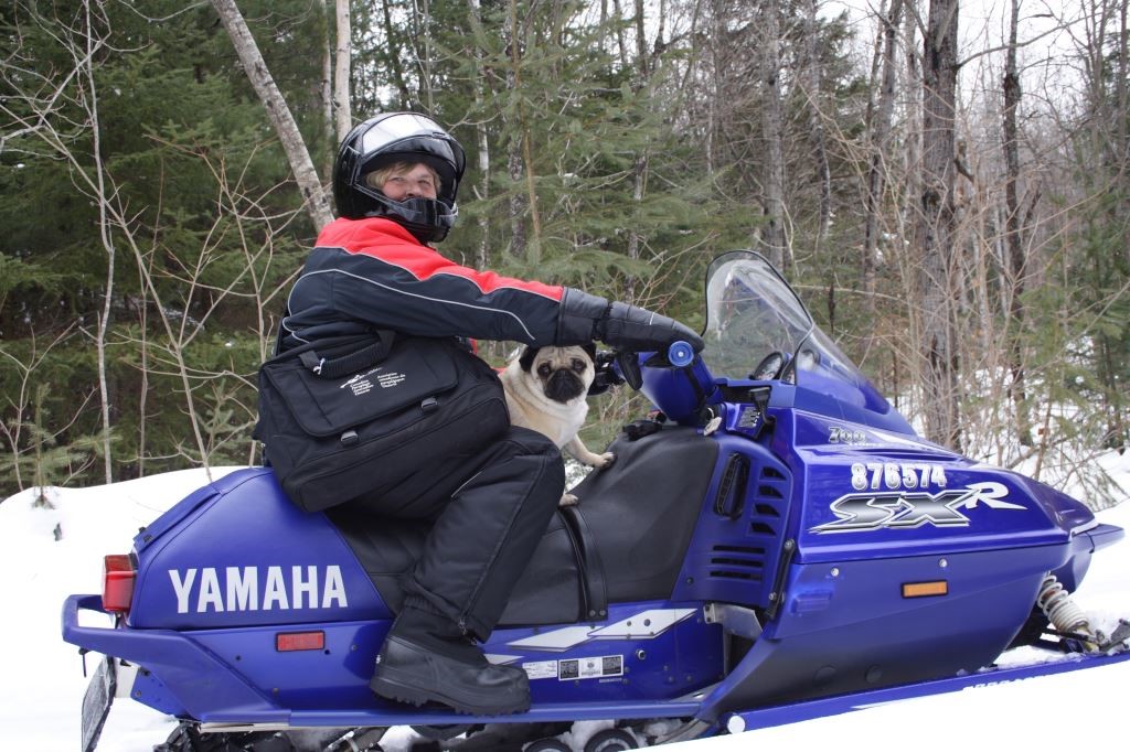 Heather on a snowmobile