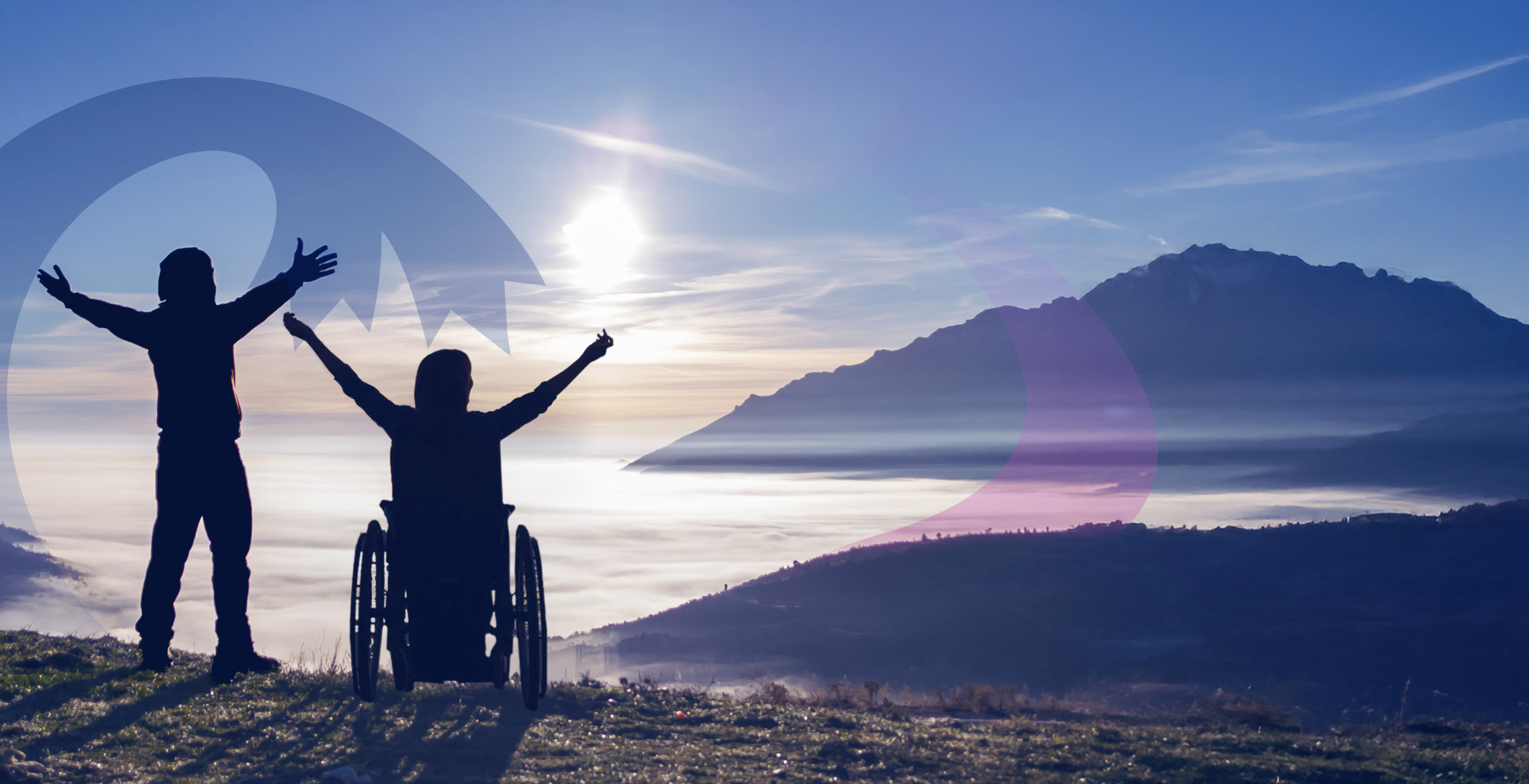 two people, one standing, one in a wheelchair, on a mountaintop admiring a sunlit view with a cloud inversion with arms triumphantly outstretched