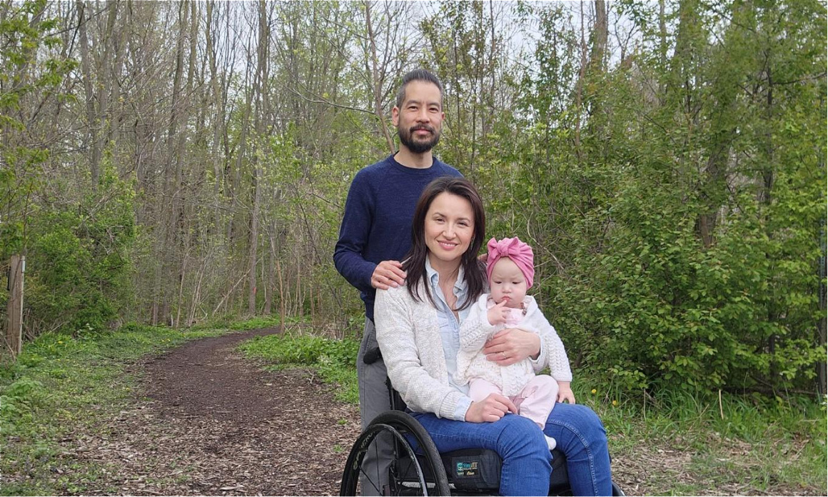 Danielle and her family out in the woods