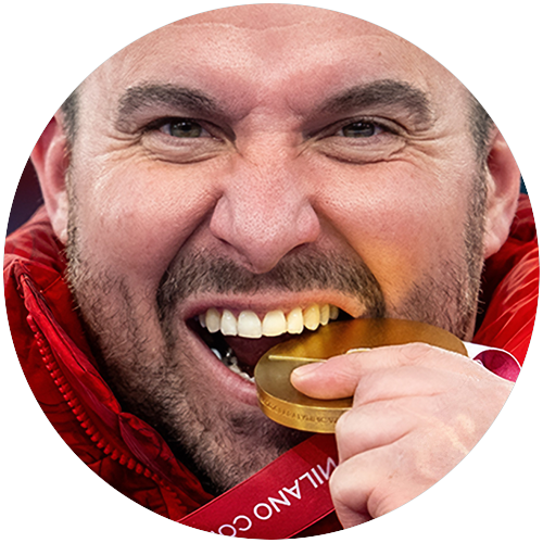 Jon Thurston bites his gold medal