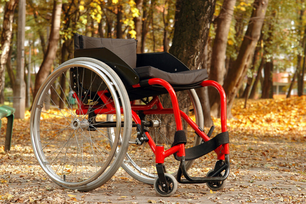 Lightweight wheelchair in wooded parkland