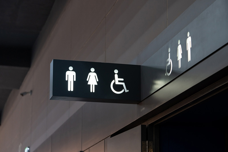 male female accessible toilet signage